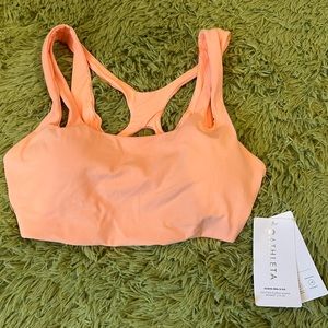 light orange sports bra